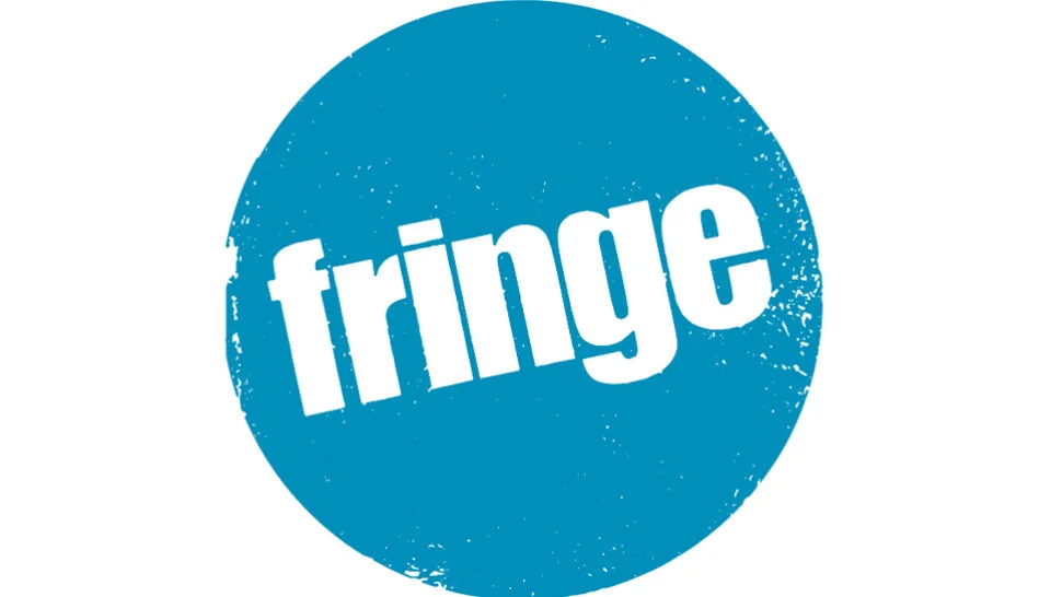 Edinburgh Festival Fringe logo. The word Fringe in white on a blue circular background